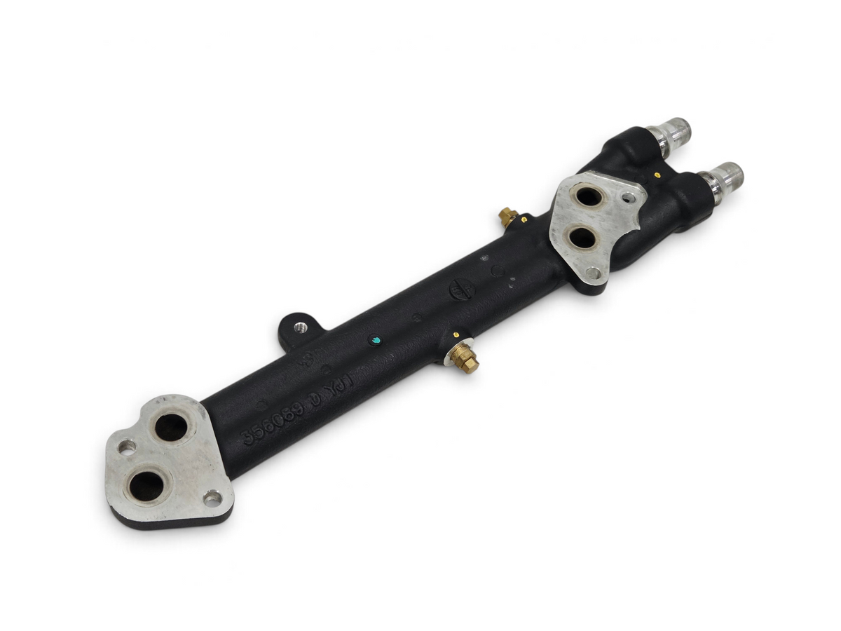 Send it Auto Parts OEM LT4 supercharger water manifold for GM 6.2L V8 engines, featuring a black finish and metal ports.