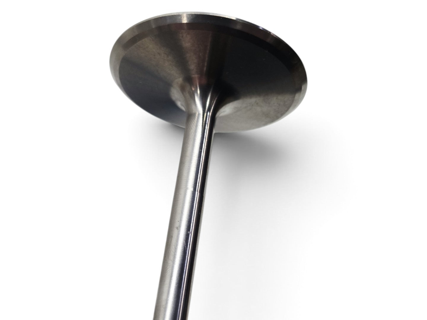 Send it Auto Parts OEM GM Gen V LT4 titanium intake valve with minor surface marks from storage