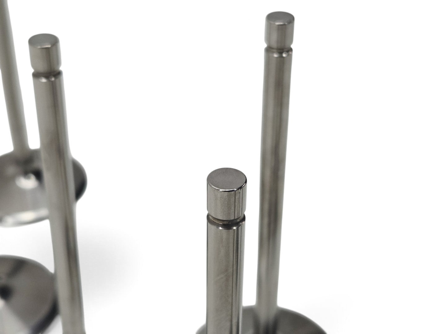 Send it Auto Parts set of 8 OEM GM Gen V LT4 titanium intake valves for Corvette, Camaro, and CTS-V engines.
