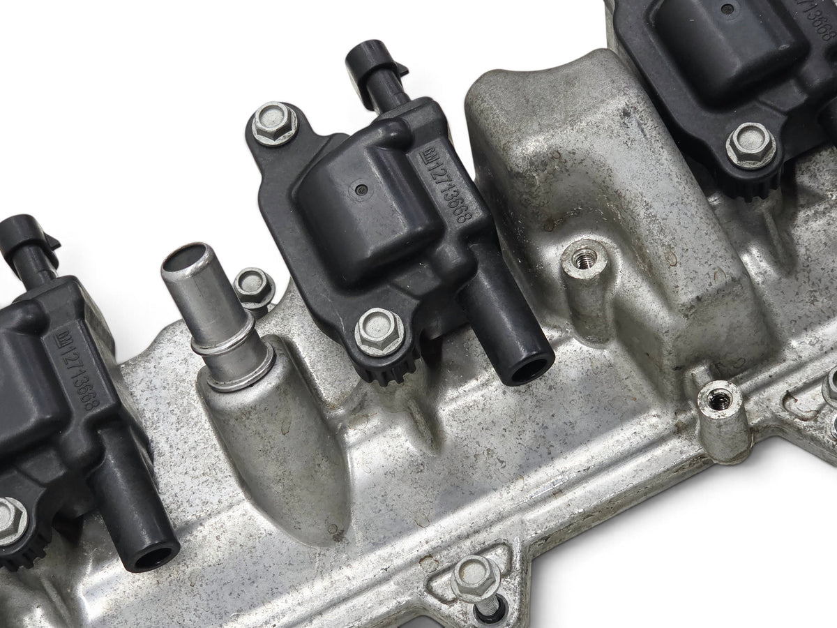 Send it Auto Parts OEM GM Gen V LT4 6.2L valve covers with ignition coils for Camaro and Cadillac V-series engines.