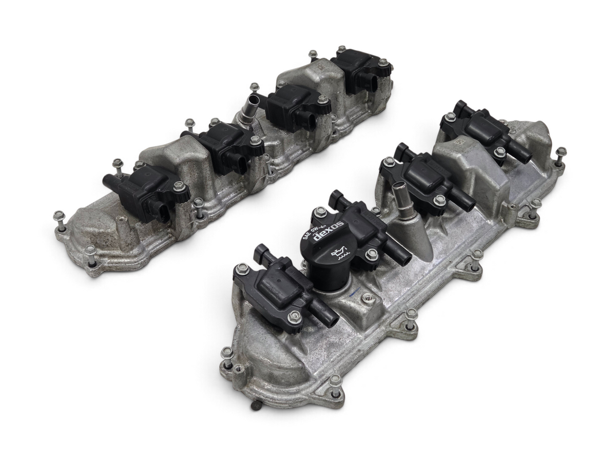 Send it Auto Parts OEM GM valve covers with ignition coils for 6.2L LT4 V8 engines, silver metal finish.
