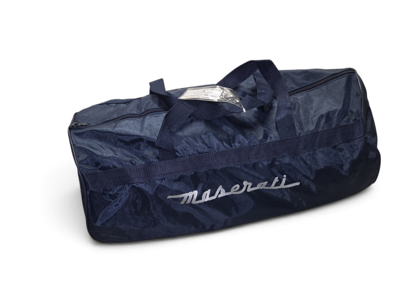 Send it Auto Parts blue Maserati GranTurismo indoor car cover in a branded storage bag with silver lettering