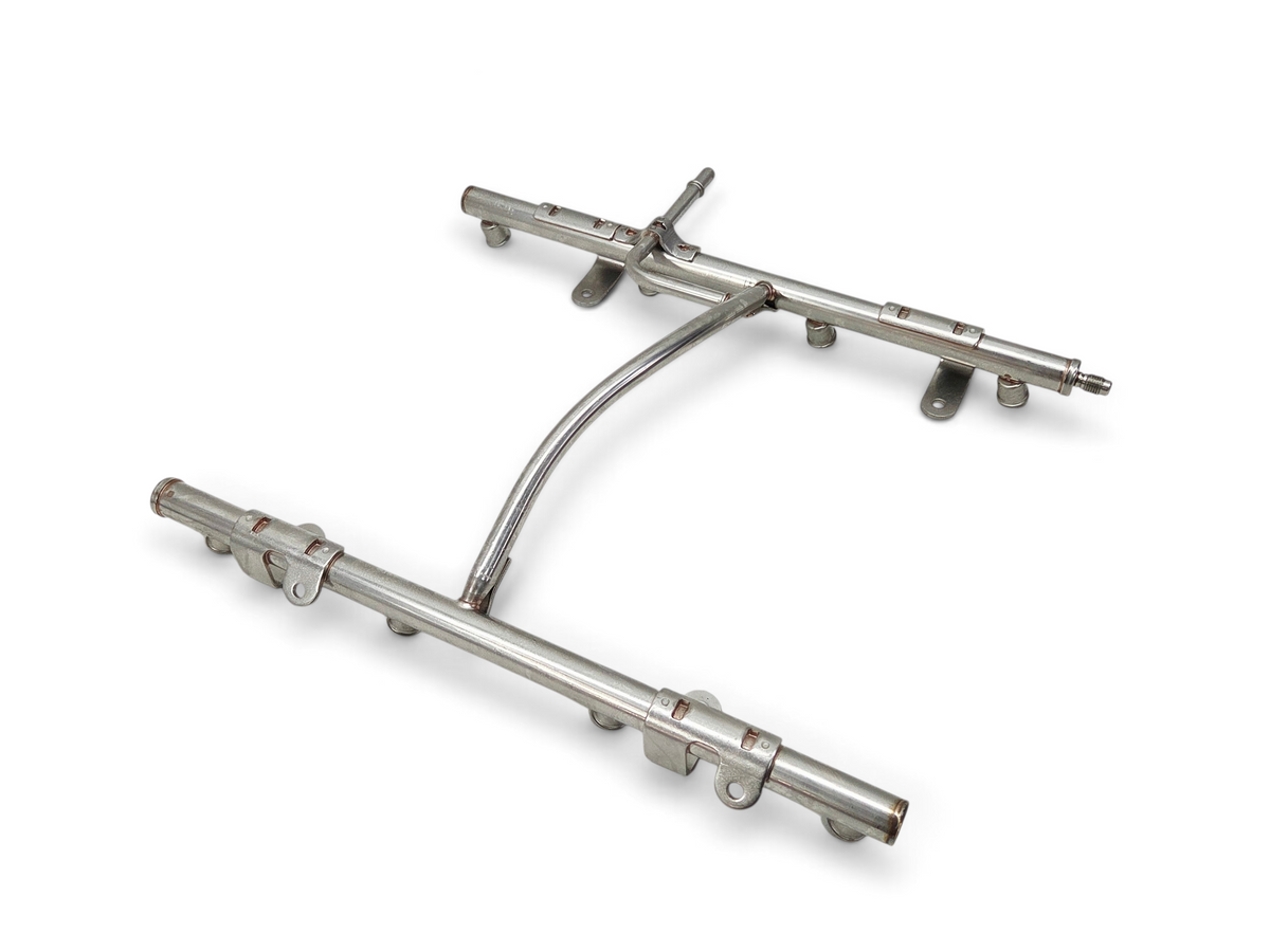 Send it Auto Parts OEM GM fuel injector rail for LS2 and LS3 engines, silver metal automotive part