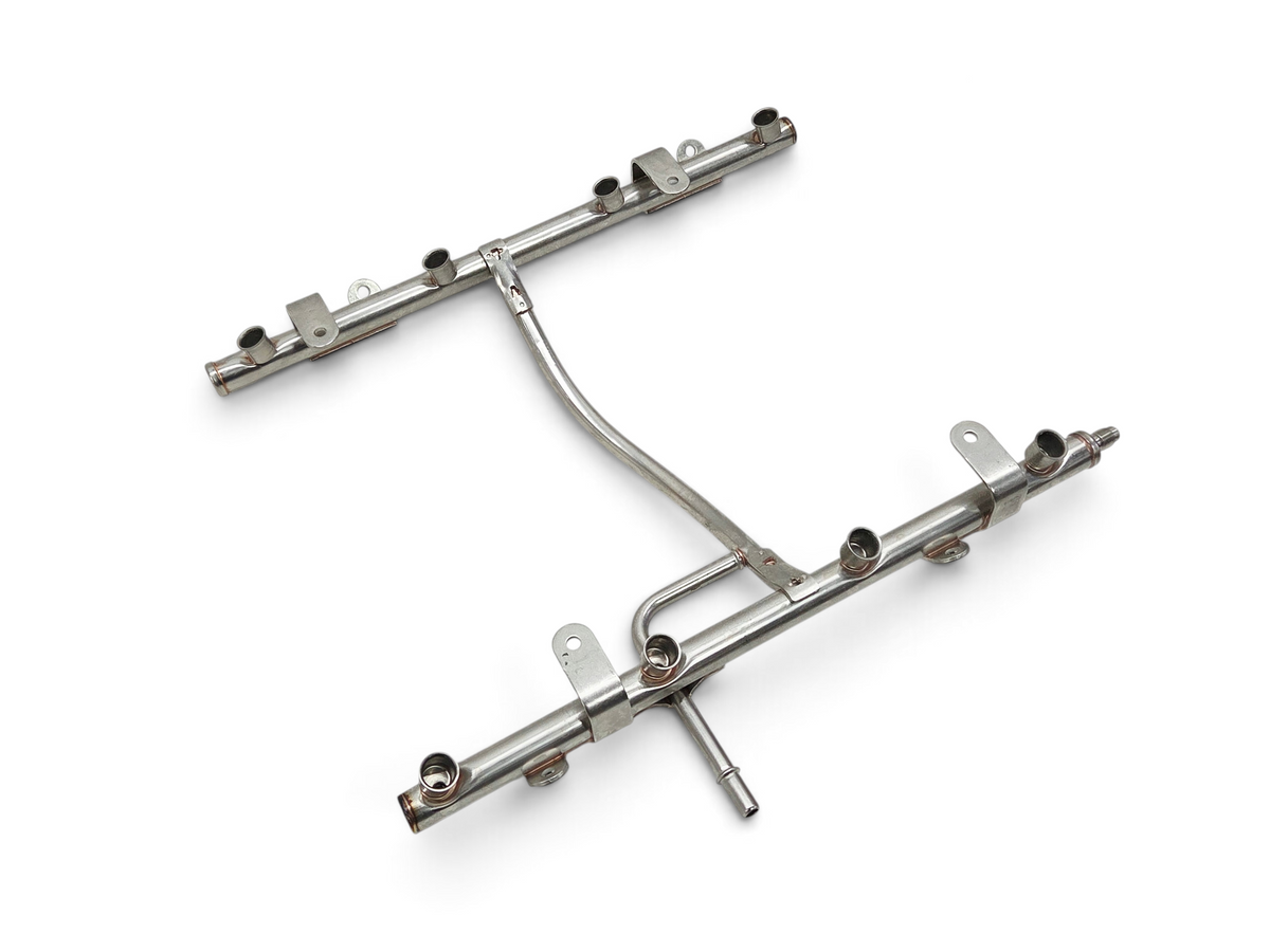 Send it Auto Parts OEM GM fuel injector rail for LS2 and LS3 engines, silver metal automotive part