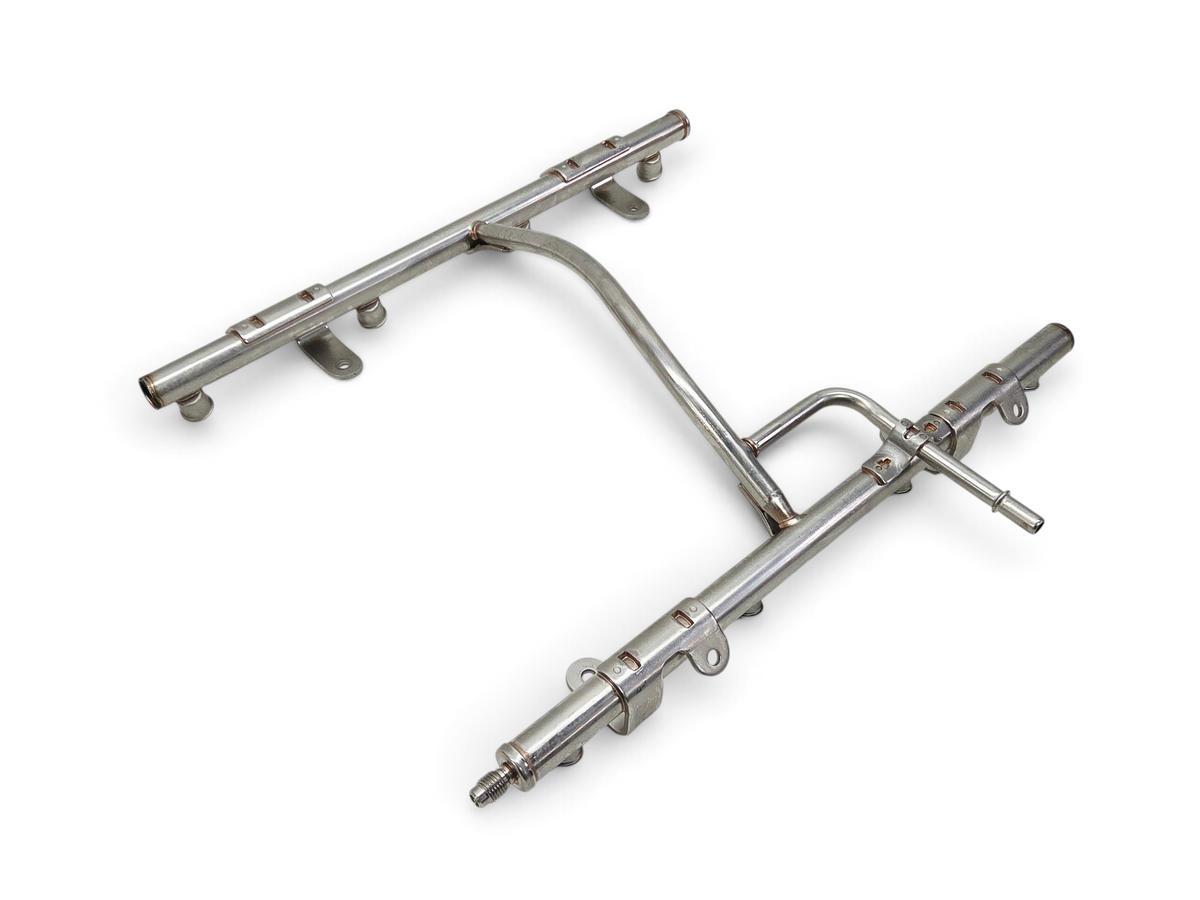 Send it Auto Parts OEM GM fuel injector rail for LS2 and LS3 engines, silver metal construction
