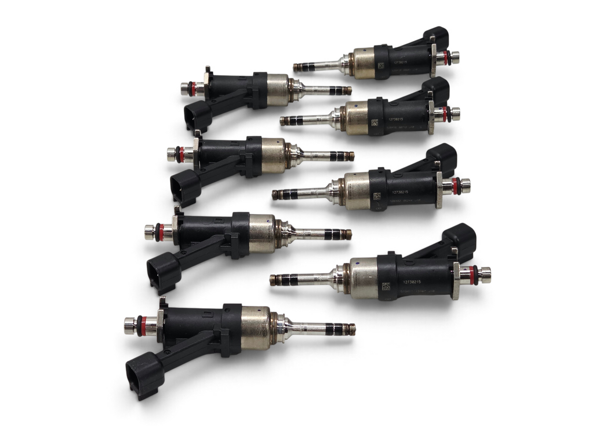 Set of eight OEM Send it Auto Parts 6mm tip direct injection fuel injectors for GM Gen V V8 engines.