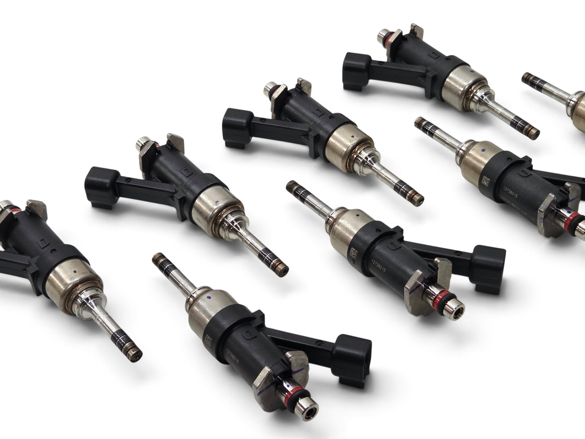 Send it Auto Parts set of eight OEM 6mm tip direct injection fuel injectors for GM Gen V V8 engines.