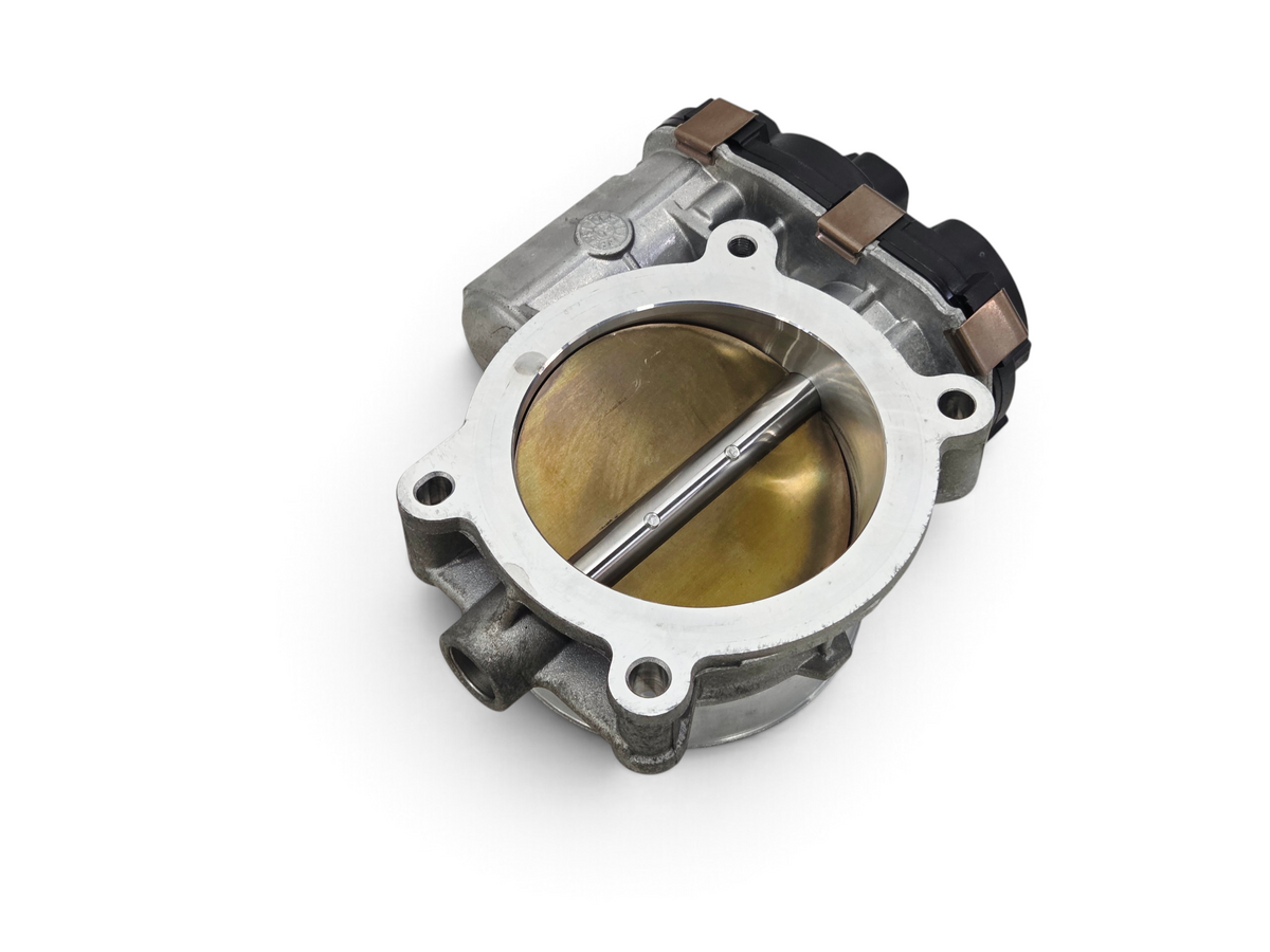 Send it Auto Parts OEM GM throttle body for 2009-2013 GMC Sierra and Silverado engines, metal construction.