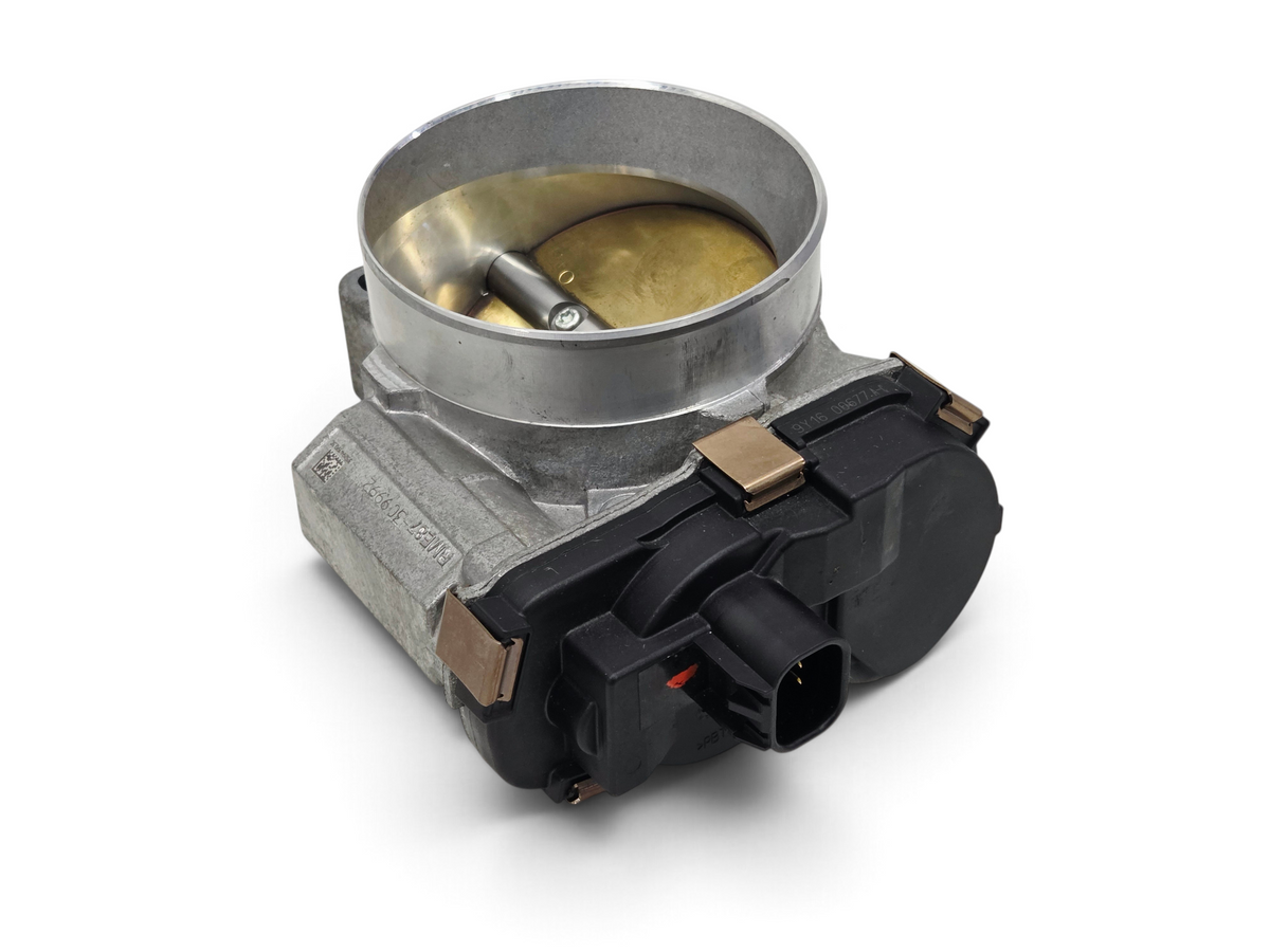 Send it Auto Parts OEM GM throttle body for GMC Sierra and Silverado engines, featuring a silver metal housing.