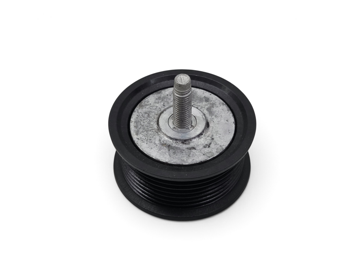 Send it Auto Parts OEM GM idler pulley for 6.2L LT4 engines, featuring a black grooved design and metal center.