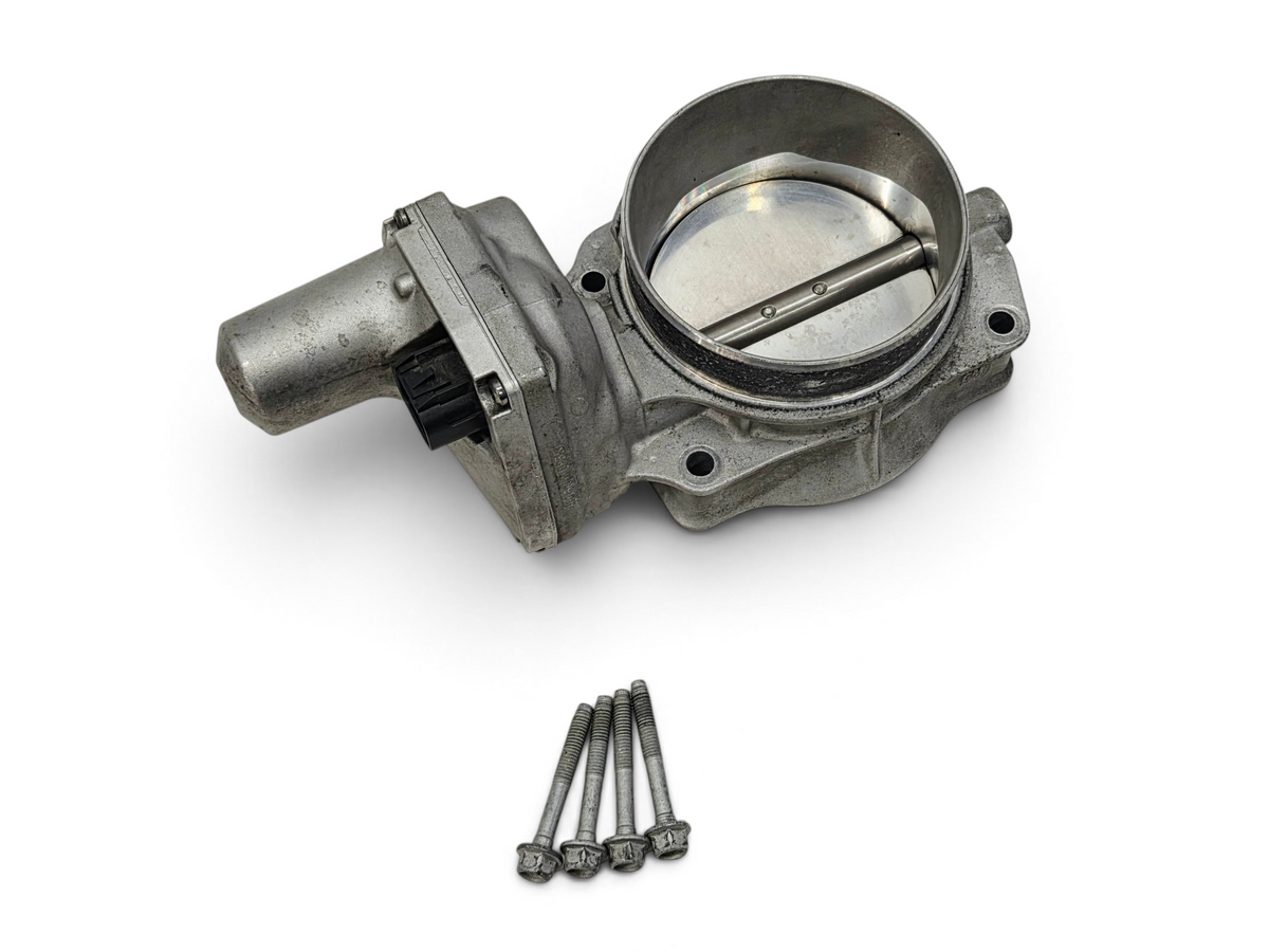 Send it Auto Parts OEM silver throttle body for LS engines with mounting bolts, top view on white background.