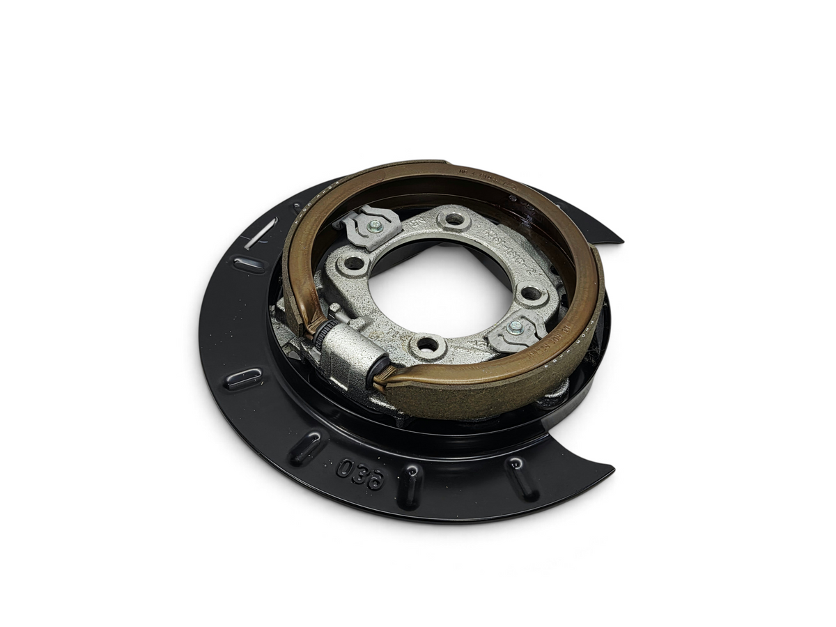 Send it Auto Parts OEM parking brake assembly with backing plate, shoes, and adjuster for GM trucks and vans.