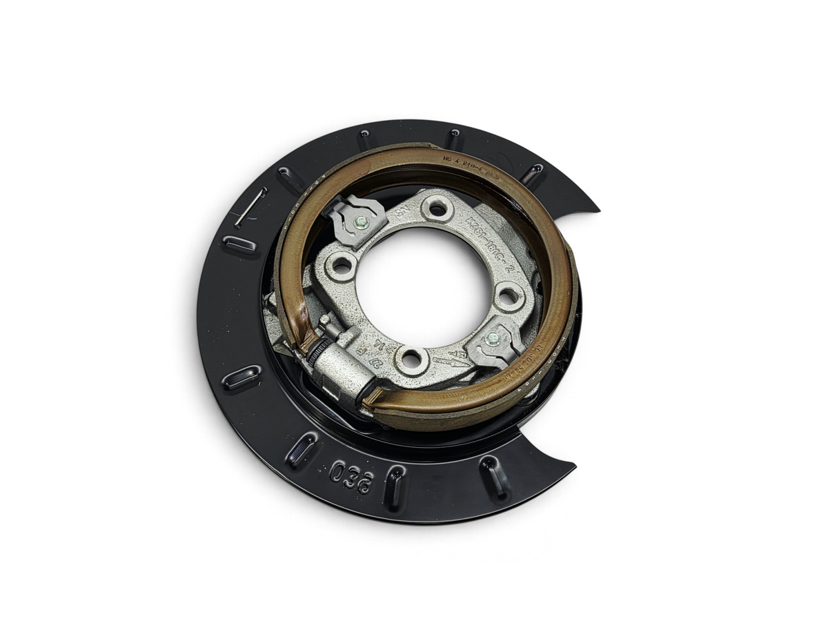 Send it Auto Parts OEM parking brake assembly with backing plate, shoes, and adjuster for GM trucks and vans.