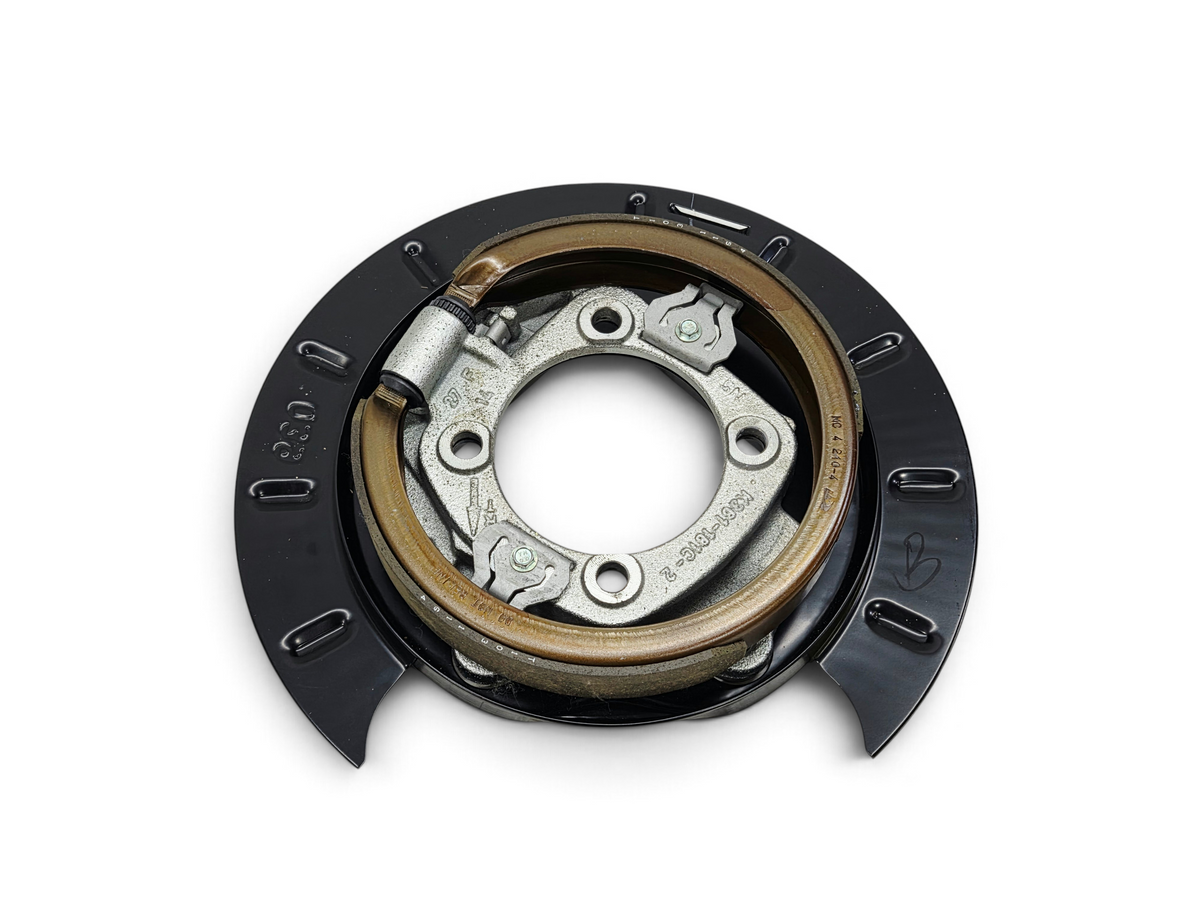 Send it Auto Parts OEM parking brake assembly with backing plate, shoes, and adjuster for GM trucks and vans.