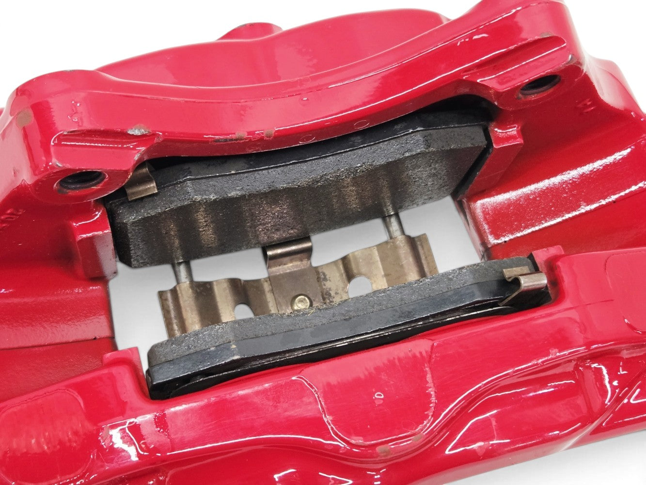 Send it Auto Parts OEM red Brembo rear brake calipers with pads for 2017-2024 Chevrolet Camaro ZL1