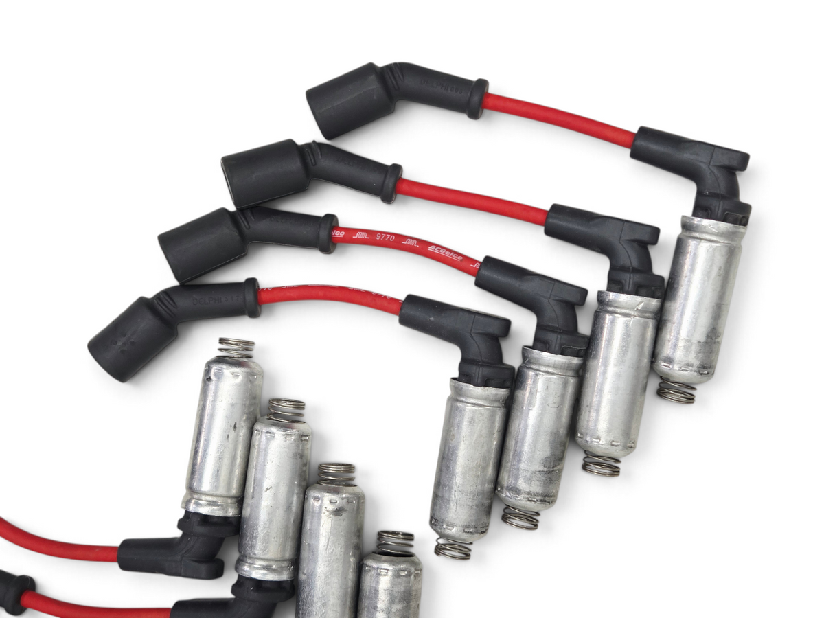 Send it Auto Parts red ACDelco spark plug ignition wires for GM LS engines with black boots and metal heat shields