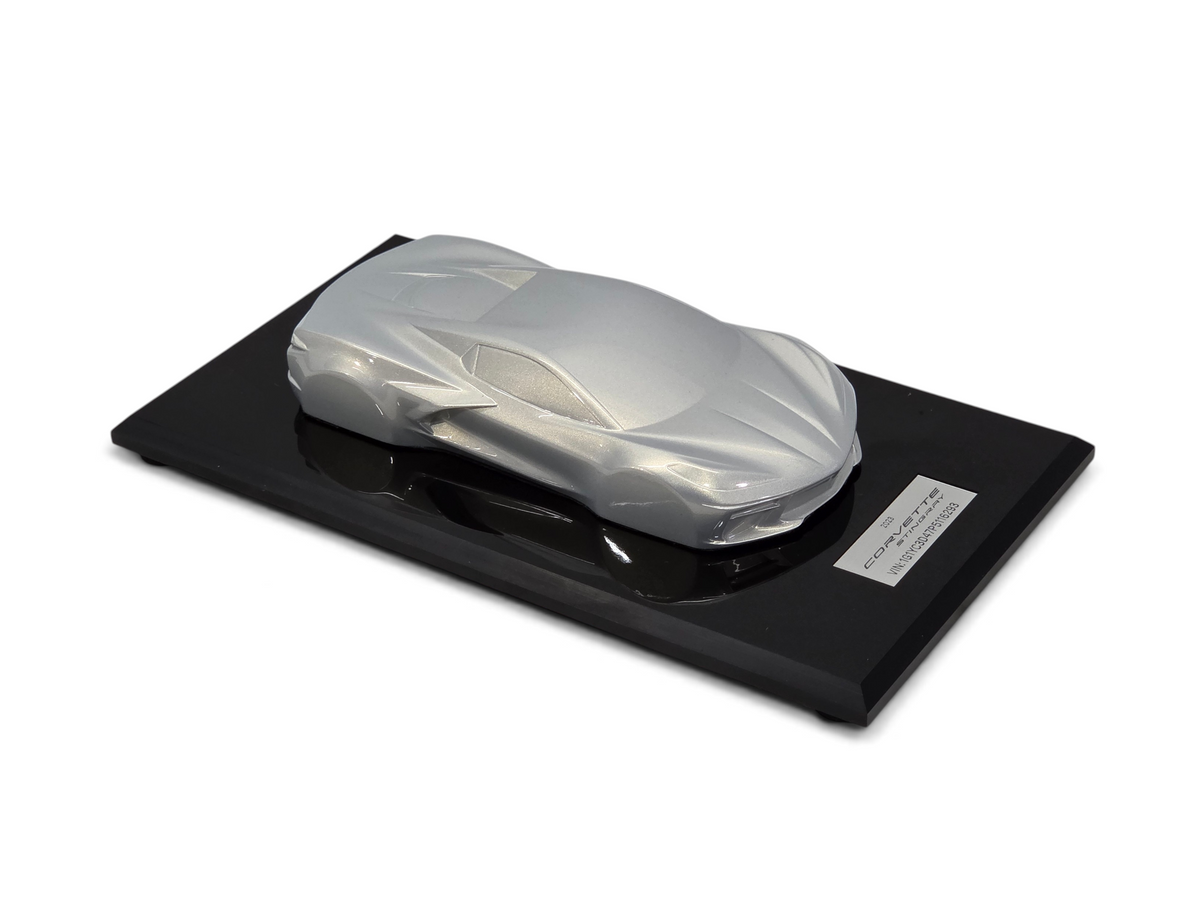 Send it Auto Parts 1:18 scale 2023 Corvette C8 Stingray speedshape model in Silver Flare on a black display base