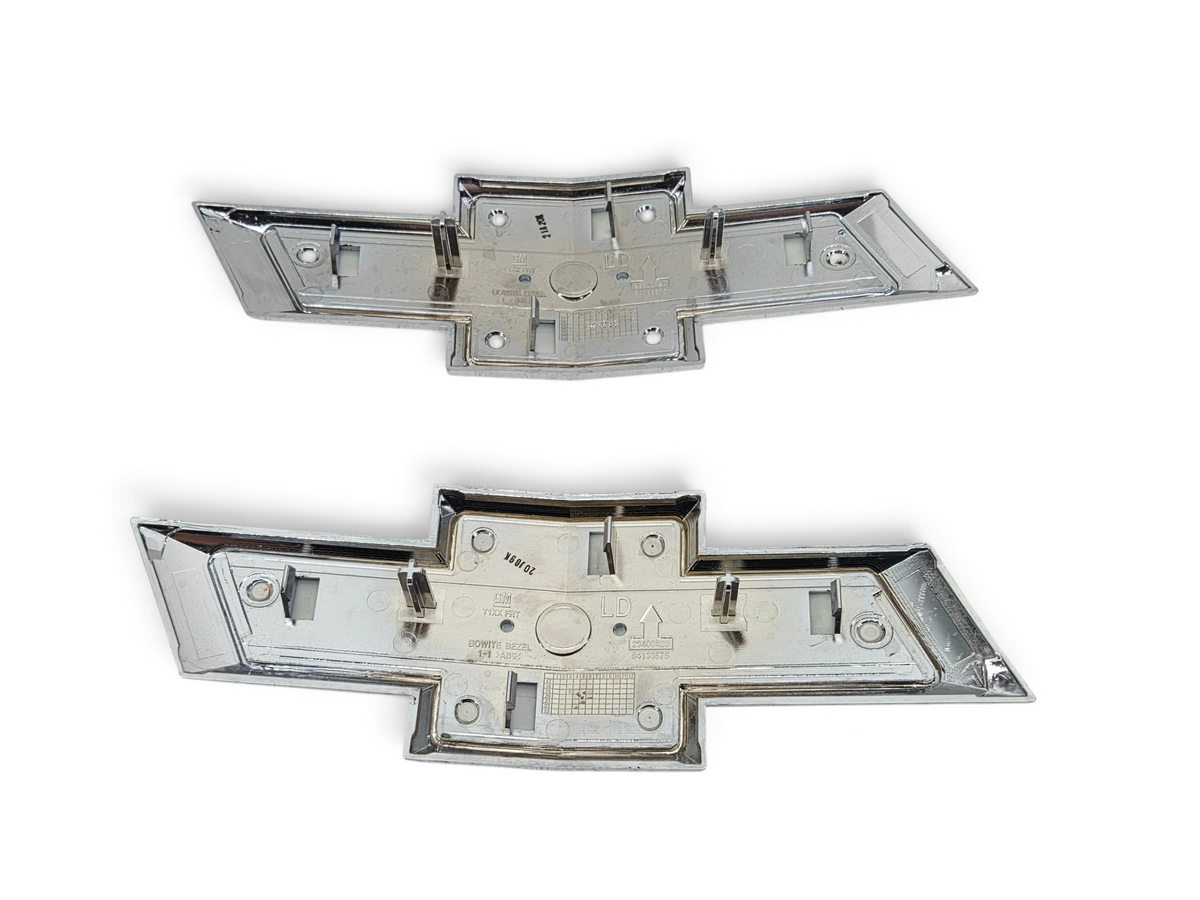 Send it Auto Parts set of four genuine OEM gold Chevrolet Silverado 1500 front grille bowtie emblems, rear view.