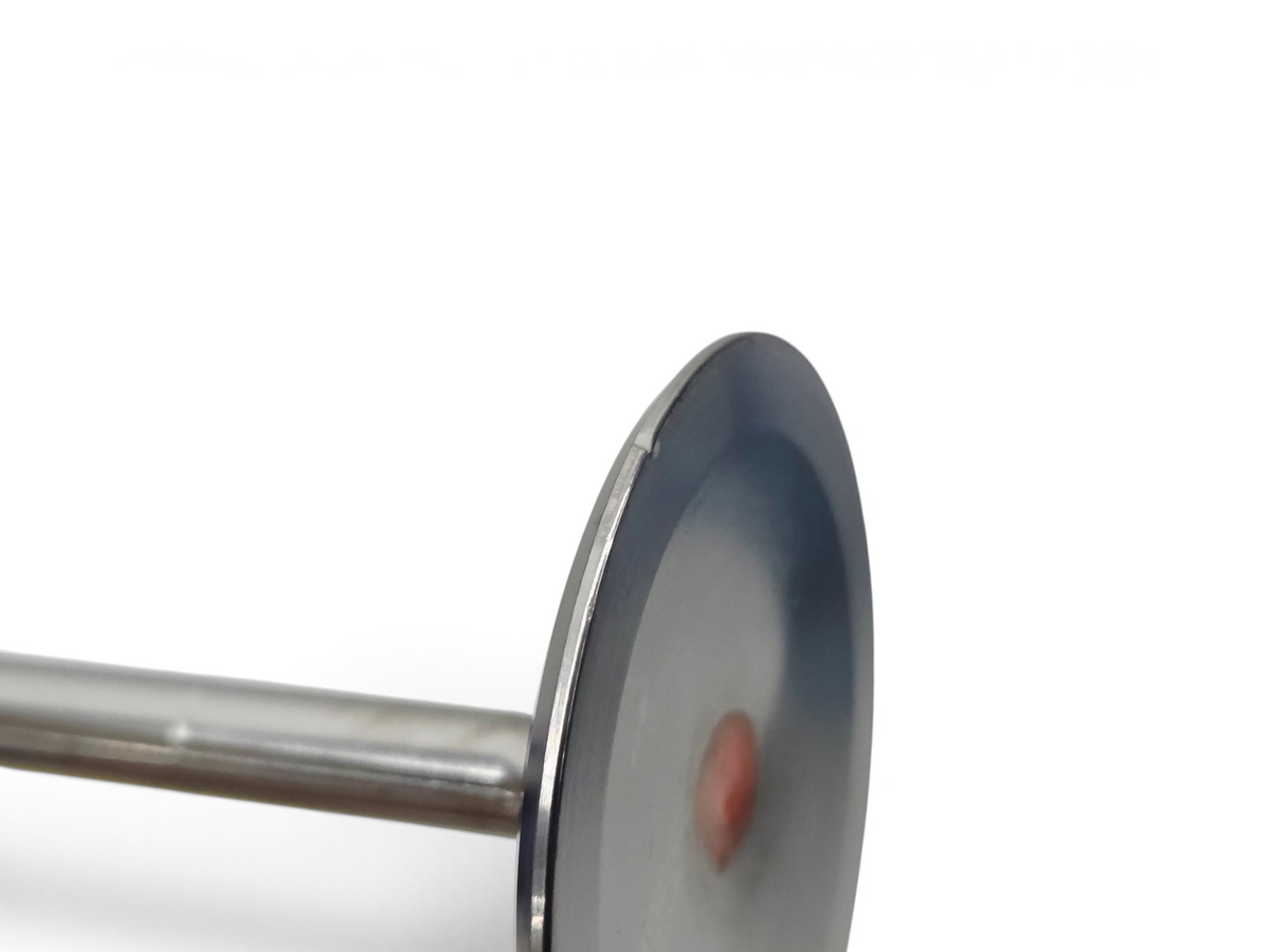 Send it Auto Parts OEM titanium intake valve for Gen V LT4 engines showing minor edge indentations