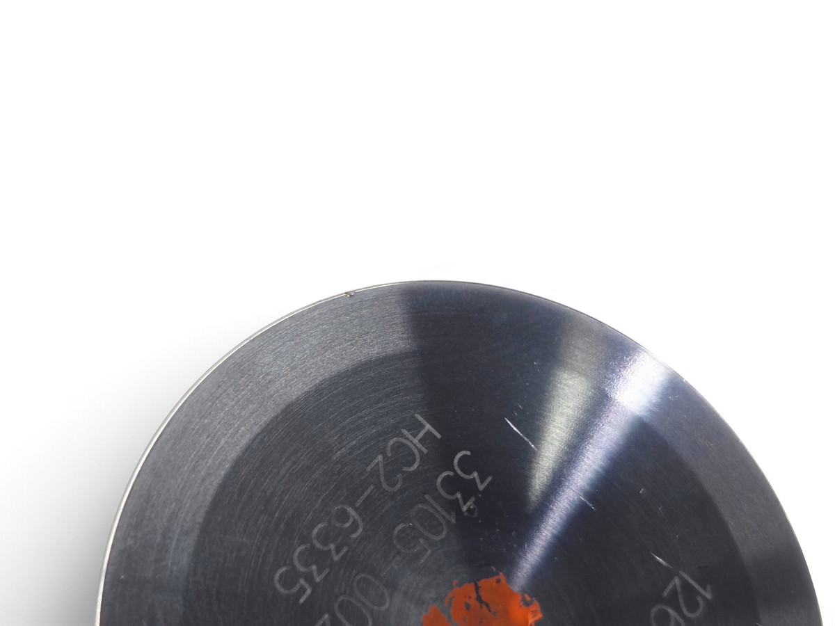 Send it Auto Parts OEM titanium intake valve for Gen V LT4 engines, showing surface markings and part details.