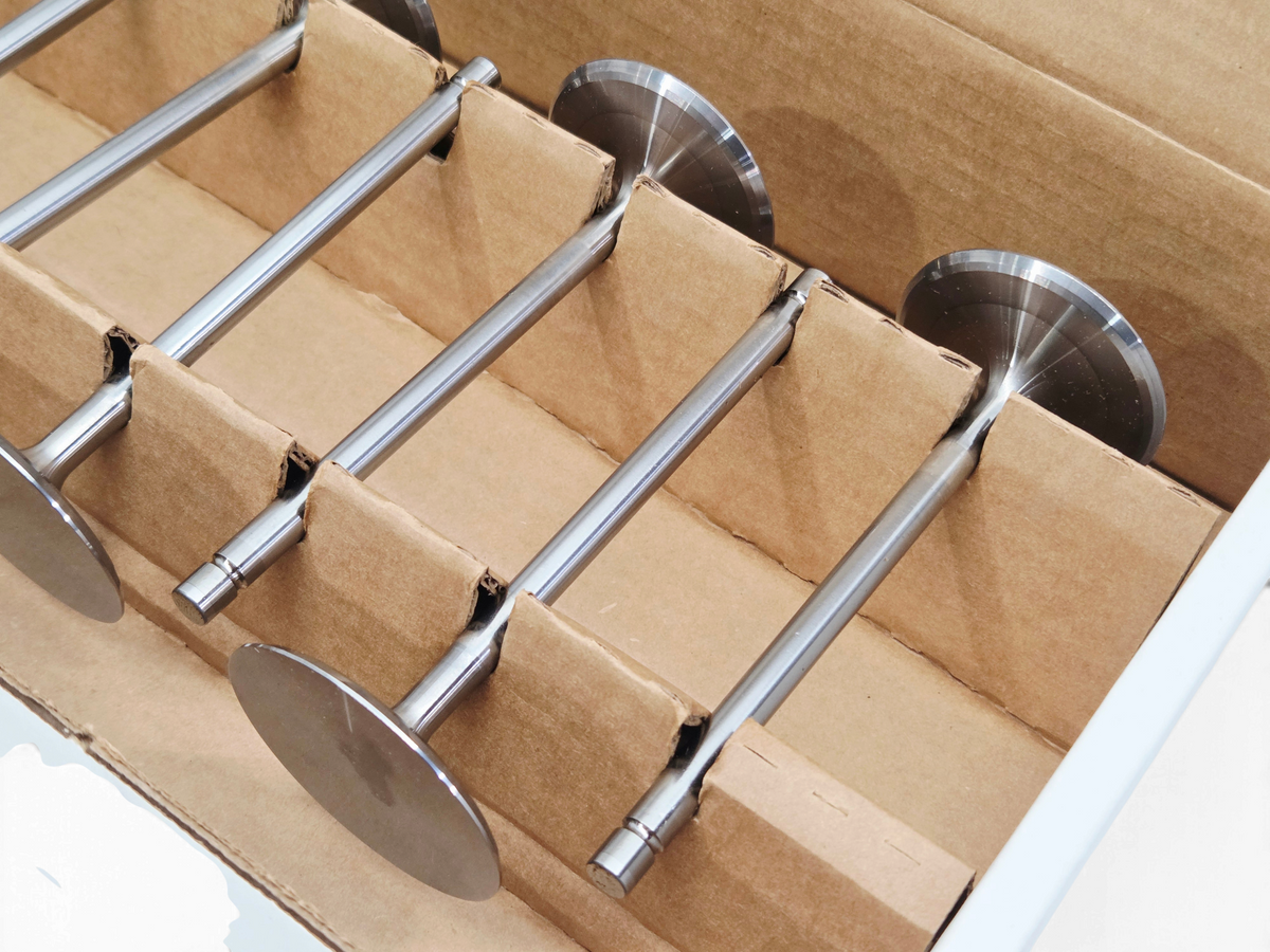 Send it Auto Parts Xceldyne LS7 titanium intake and exhaust valves with chrome nitride coating in a cardboard box